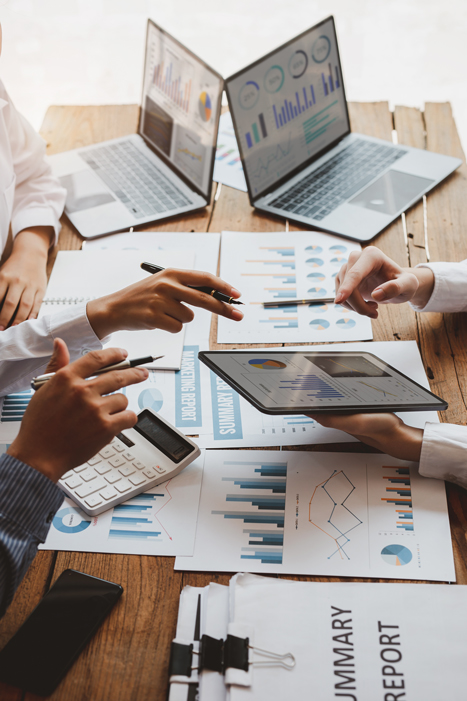 Consulting and Marketing team, Cropped shot of diverse coworkers working together in the boardroom, brainstorming, discussing, and analyzing business strategy.